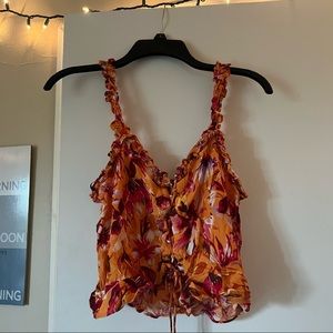 Orange tropical floral tank top with ruffles